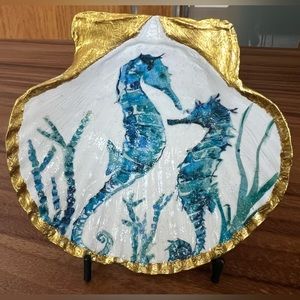 Handmade decoupage seahorse design on scallop shell